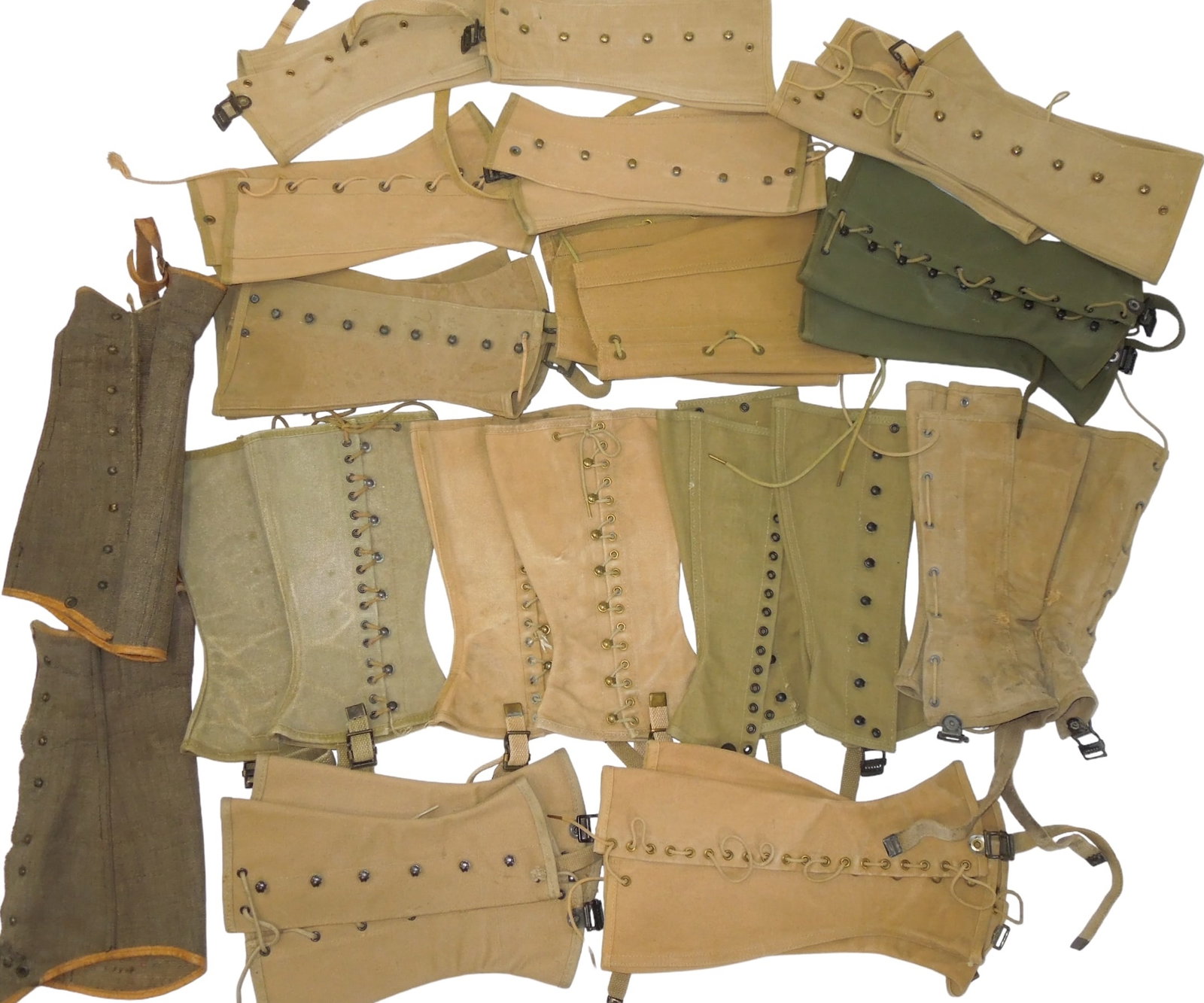 Lot (13) WWI - WWII US Army USMC Navy Leggings Gaiters Some Named: WWI - WWII US Army USMC Navy Leggings Gaiters. Lot of (13). Some Leggings are named. Some of the pieces you are bidding on are marked as follows: (2) 1942 Gregory and Read Co., 1938 Johnson, Stephens 