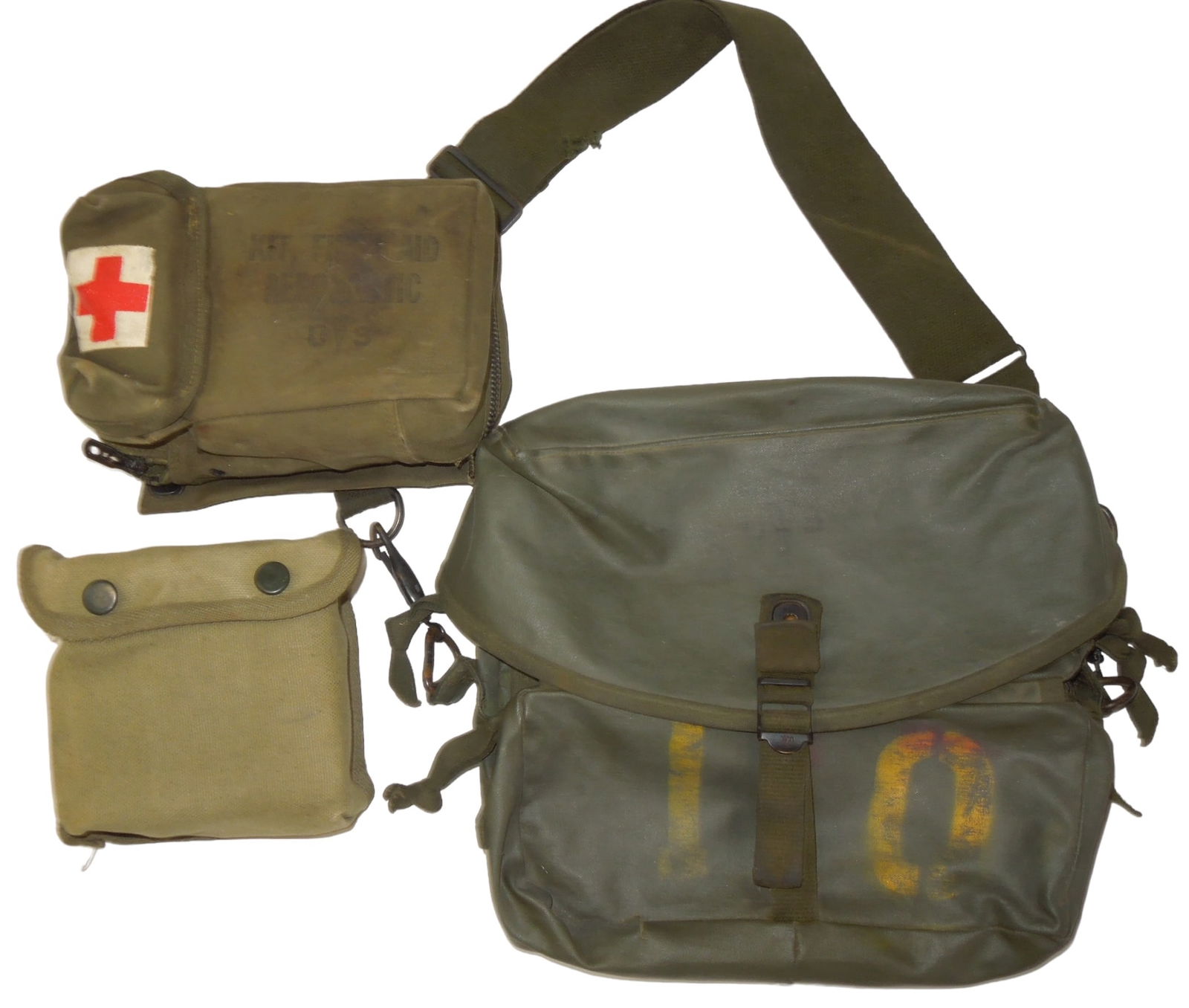 Lot (3) WWII - Vietnam War US Military First Aid Kits & Medical Bag: WWII - Vietnam War US Military First Aid Kits & Bags. Lot of (3). Both First Aid Kits are filled with medical supplies. One of the First Aid Kits the zipper is broken. The Medical bag is rubberized an