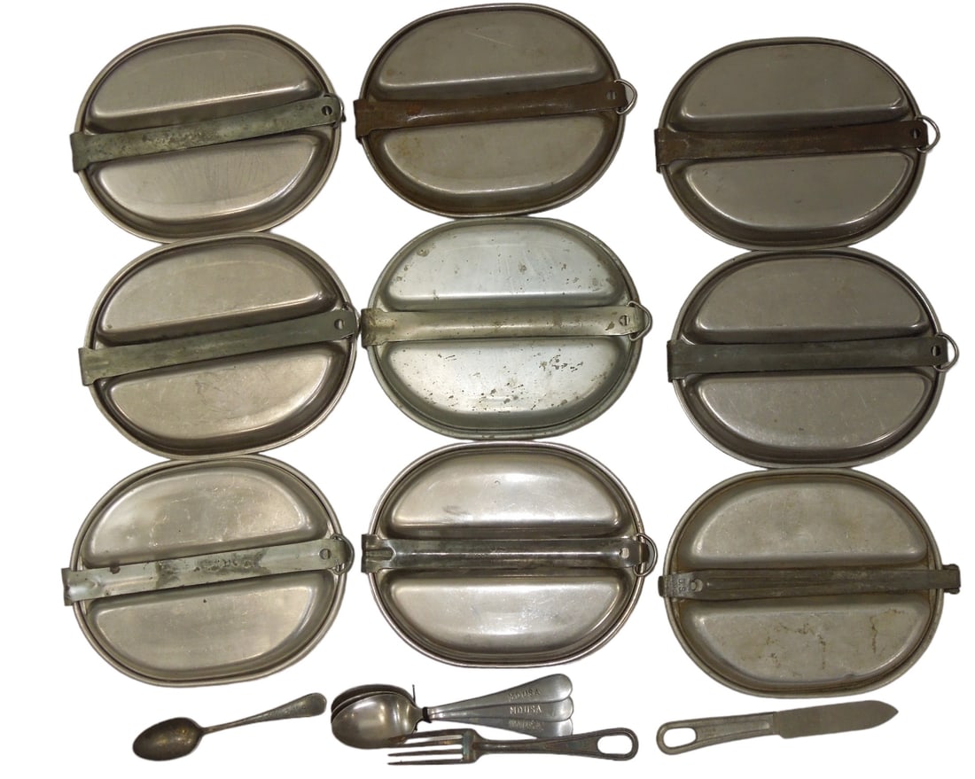 Lot (9) WWII Era Dated US Military Mess Kits & Utensils A.G.M. Knapp-Monarch Dazey Leyse: WWII Era Dated US Military Mess Kits & Utensils. Lot of (9). Some of the Maker Marks that can be seen are the following: 1944 US M.A. CO. (David Campbell), US 1951 Dazey Corporation, 1945 US Massillon