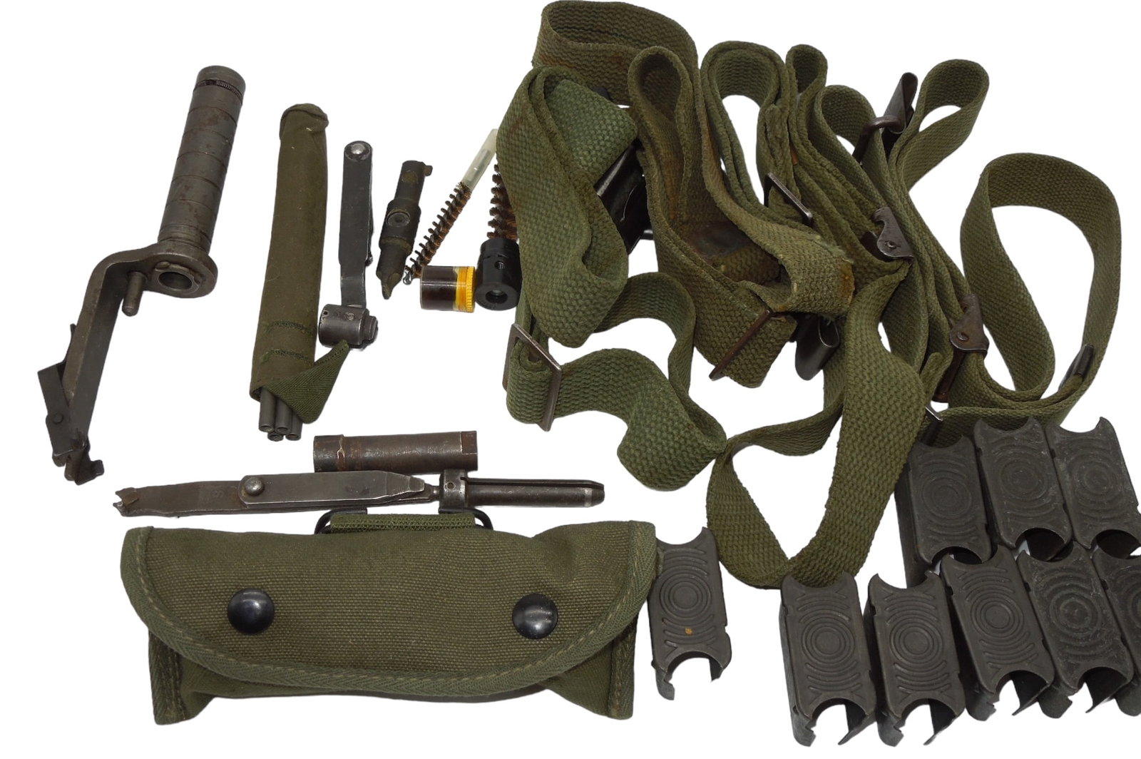 Lot WWII - Korean War US Military Rifle Slings Grenade Attachments M-1 Enblocs: Lot of four rifle slings (OD green canvas), rifle grenade attachments for the M-1 Garand rifle, cleaning parts, and empty M-1 Garand enbloc clips. Good condition showing wear consistent with age.