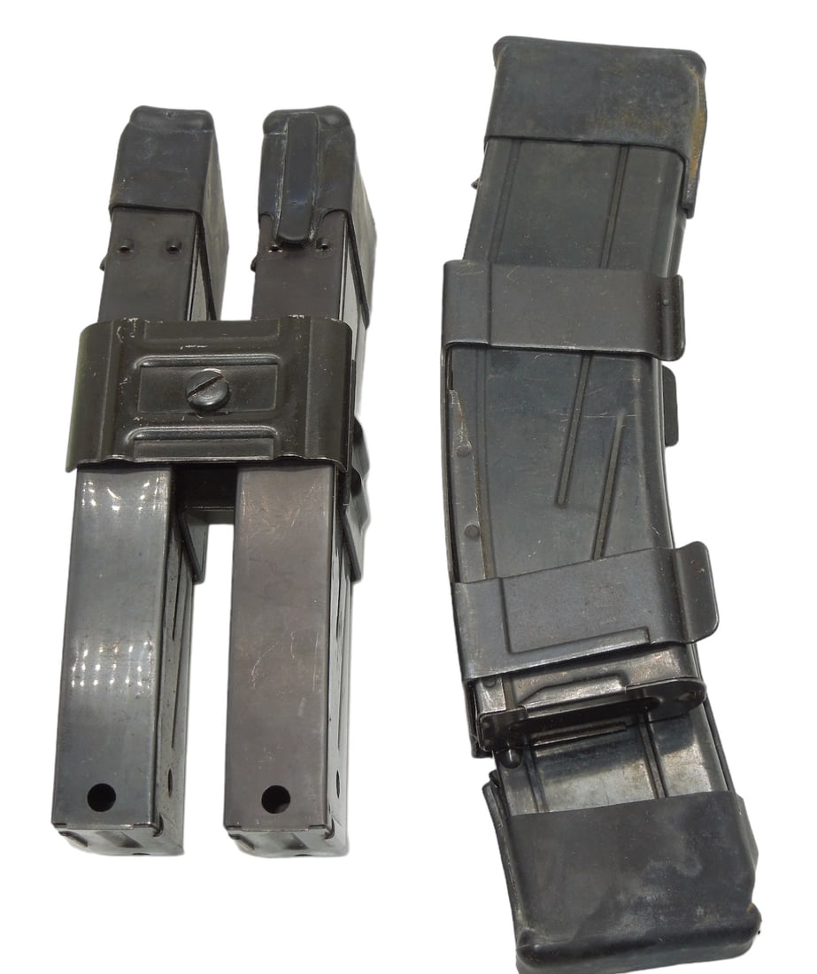 Lot (4) Korean War Era US Army M-1 Carbine Magazines: Two sets of double larger size Korean War M-1 Carbine magazines. Unknown if they are in working order, but they appear to be in good condition.