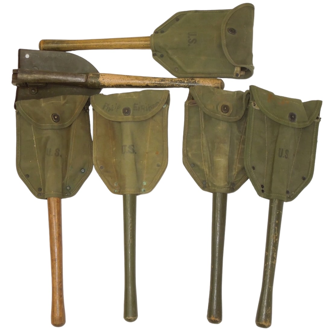 Lot (6) WWII - Vietnam War US Military Entrenching Tool Shovels & Covers: Six folding entrenching tools, with various dates and makers such as Wood 1945, Ames 1945, Ames 1944, Ames 1966, and more. All are in well used condition.