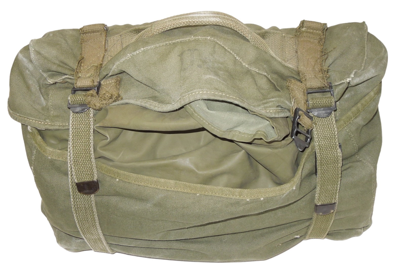 WWII 1945 Dated US Military Mildew Resistant Treo OD Field Tent: March 1945 Dated field tent, mildew resistant, with tag and mosquito netting. Comes with two metal stakes. We did not open the tent entirely so we are not sure what else comes in the kit or the condit