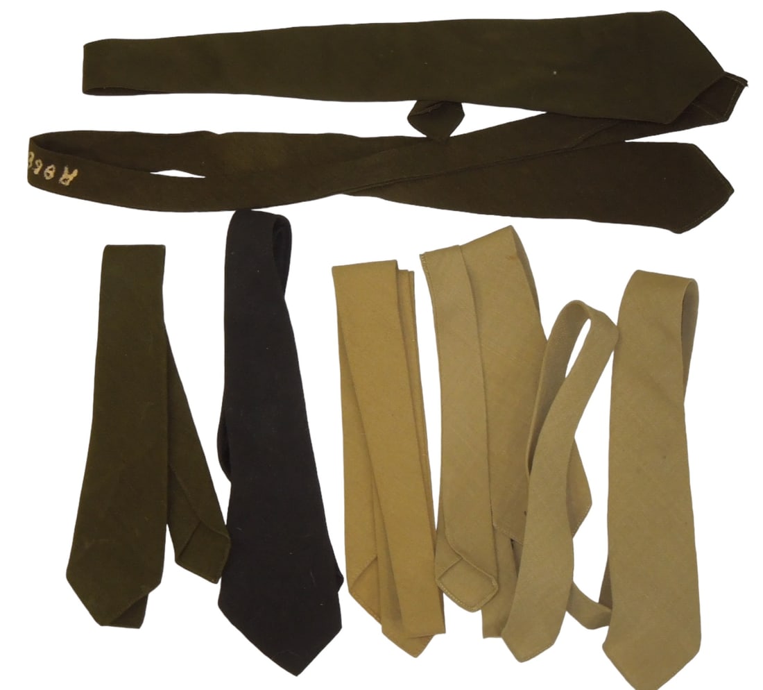 Lot WWII US Army & Air Force Uniform Ties: Lot of WWII era uniform ties, some of which are named or have laundry marks on the back. Fair to Good condition showing wear consistent with age.