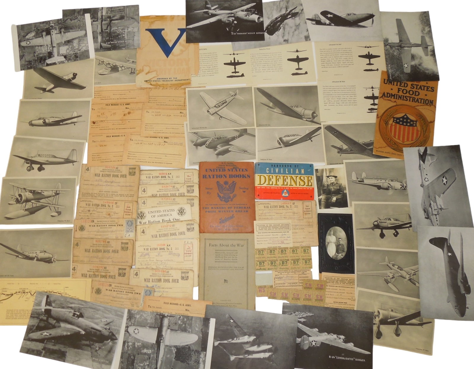 WWII US Military Ration Books, Recognition Plane Spotting Cards & Paper Ephemera: WWII US Military Ration Books, Recognition Plane Spotting Cards & Paper Ephemera. Some pieces include (18+) Ration Books, Facts About The War booklet (59 pages), Civilian Defense book (94 pages), Airc
