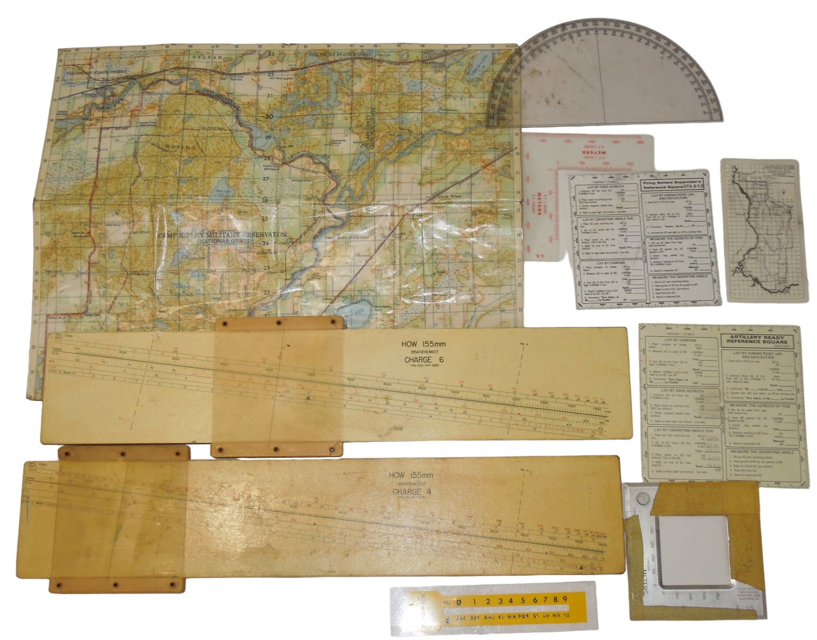 US Military WWI - Cold War Artillery Mapping & Spotting Equipment Howitzer Slide Rule: US Military WWI - Cold War Artillery Mapping & Spotting Equipment. You are bidding on the following items: Howitzer Scale Slide Rule Charge 4 / 5 and Charge 6 / 7, Map, Plotting Scale, Reference chart
