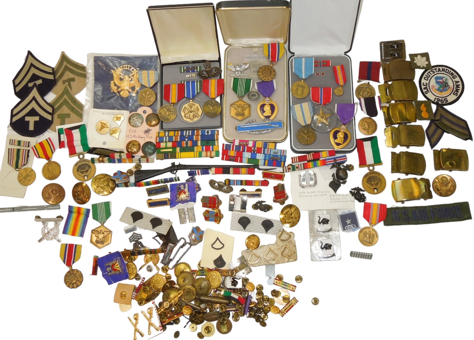 Lot WWII - Modern US Military Medals Purple Heart Ribbons Pins Buttons Patches: Very large lot of medals and insignia with the highlights being Crimp Brooch Purple Heart Medals, full sized campaign and service medals, belt buckles, ribbon bars, musket letter opener, jump wings, p