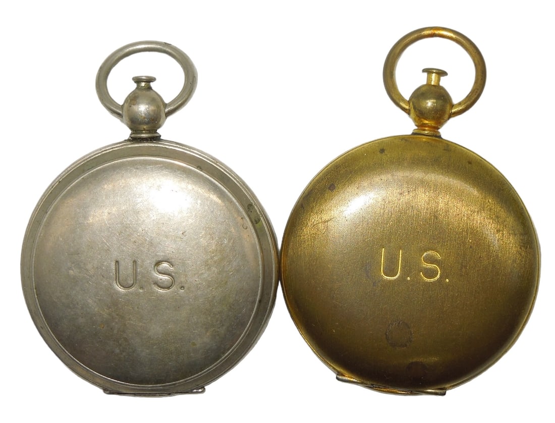 WWII US Army Engineer Pocket Compasses Wittnauer Lot of (2): WWII US Army Engineer Pocket Compasses Lot of (2). Both pieces are marked US. The silver colored compass is also maker marked Wittnauer. No maker is seen on the gold colored compass. Wear to the cover