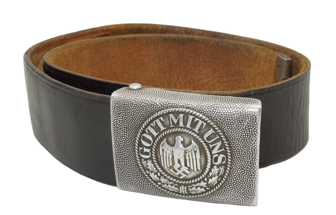 WWII German Wehrmacht Heer Belt & Buckle: Original Heer (Army) WWII buckle and black leather belt. Good condition showing wear consistent with age.