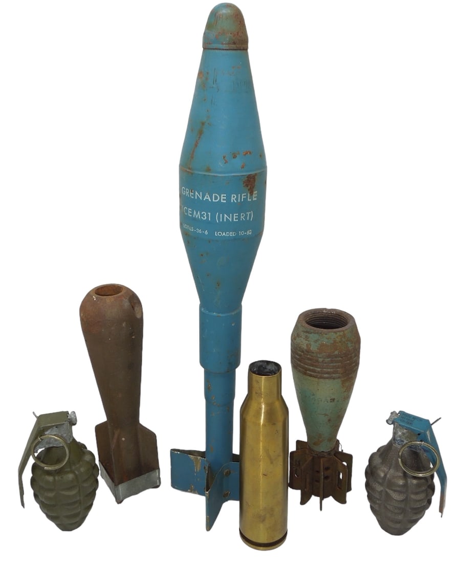 Lot WWII - Vietnam Inert Ordnance Rifle Grenade Mortars: Inert / Training items as shown: Vietnam Era blue training rifle grenade, 1917 Asian Naval Artillery shell, two hollowed out grenades, and 1943 dated 60mm mortar dummy. Fair to good condition showing 
