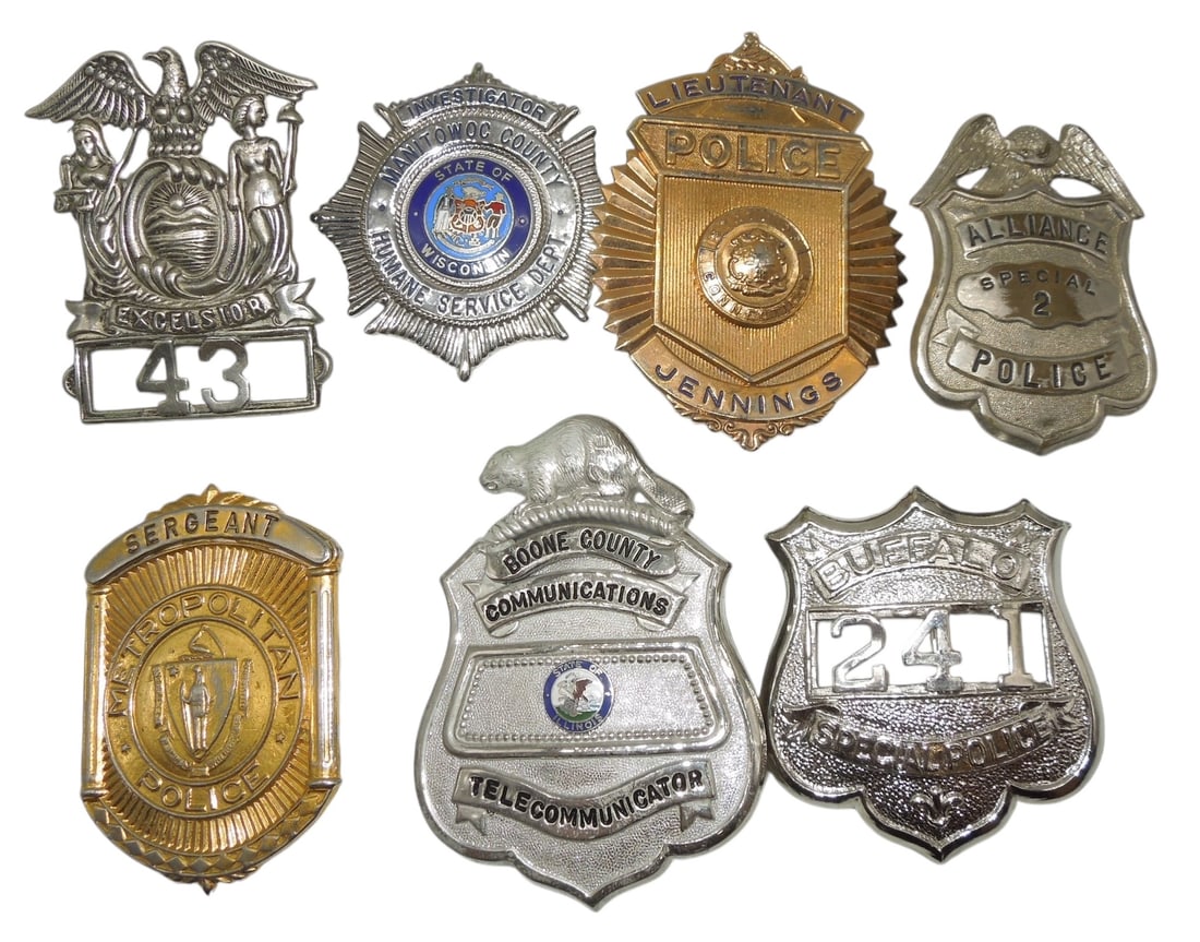 Lot (7) Vintage Law Enforcement Police Badges: Lot of six obsolete badges: Metropolitan, Police Sergeant (Boston area), Alliance, OH Special Police, Manitowoc County, WI Humane Service Investigator, Buffalo, NY Special Police, New York Police Hat 