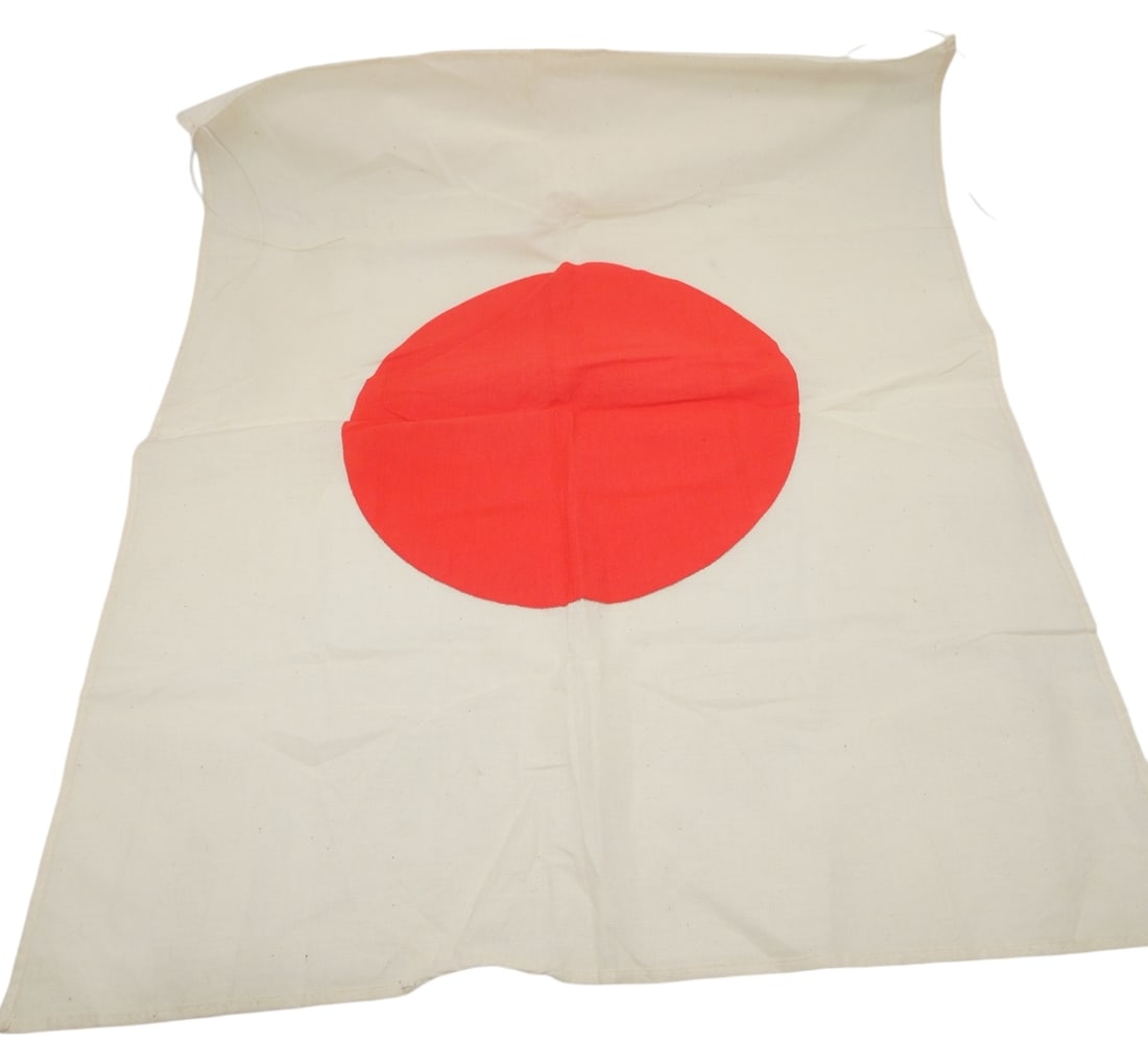 WWII Japanese Cotton Imperial Army Flag: Original cloth flag measuring 20 x 24 inches with ties at the two corners. Good condition.