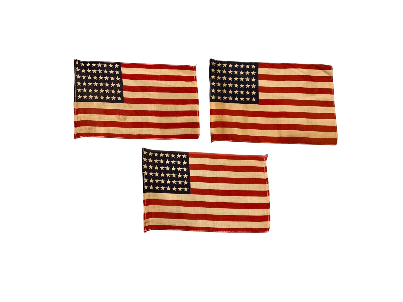 U.S. 48 Star American Flag Linen Lot of (3): U.S. 48 Star American Flag Linen Lot of (3). Approximate size of each flag is 11.5 x 7.5 inches. The condition of each flag varies. Each flag shows sign of wear from age and use. These flags are all i