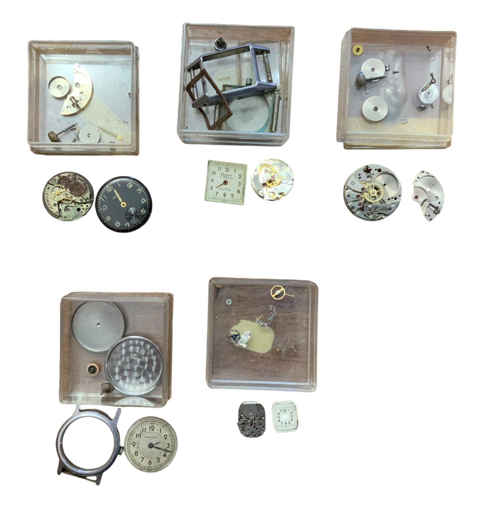 Valjean Louvic Perfine Titus Racine Gallet Hafis ETA Grant Movement & Parts Wristwatches Lot: Swiss Made wristwatch movement and parts. From what we see you may receive the following: Valjean, Louvic, Perfine, Titus, Racine, Gallet, Hafis, ETA, Grant. Some watches read 15 and 17 jewels & Swiss