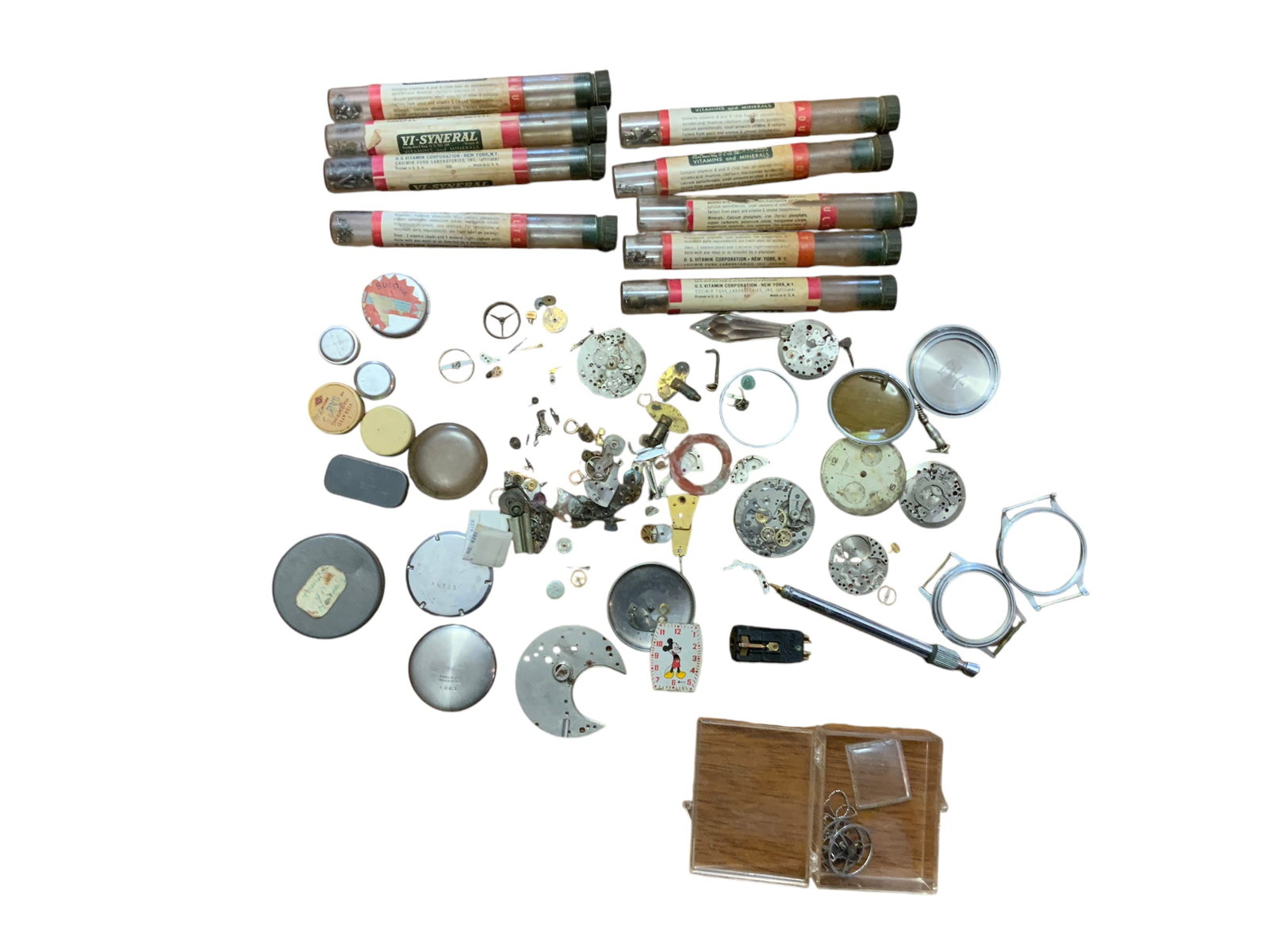 Vintage Watch Parts & Movement Pieces Large Lot: US and Swiss Made wristwatch movement, parts and pieces. These pieces and parts came altogether in the containers from the consignor. They are being auctioned for parts. All our watch parts lots are b
