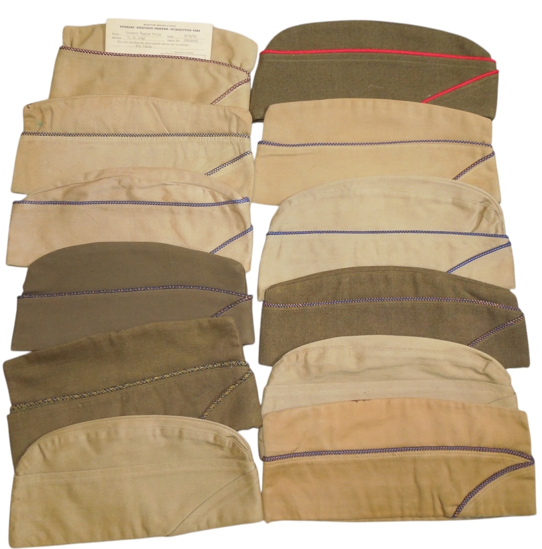 Lot (12) WWII US Army & Air Force Overseas Garrison Caps: Original lot of overseas caps, mostly Army Air Force piped. Many have laundry marks or names inside and condition ranges from poor to very good. One has a card with the Soldiers info on it.