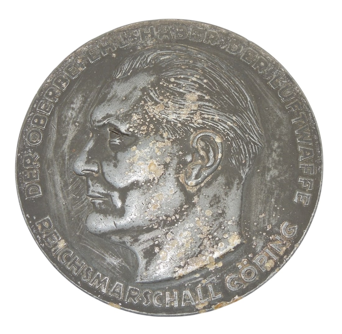 WWII German Luftwaffe Technical Merit Herman Goering Table Medal: Luftwaffe technical service medal, metal alloy construction, 3 inch diameter. The obverse of the medal showing a profile view of Goring with his title, The Supreme Commander of the Air Force Reichsmar