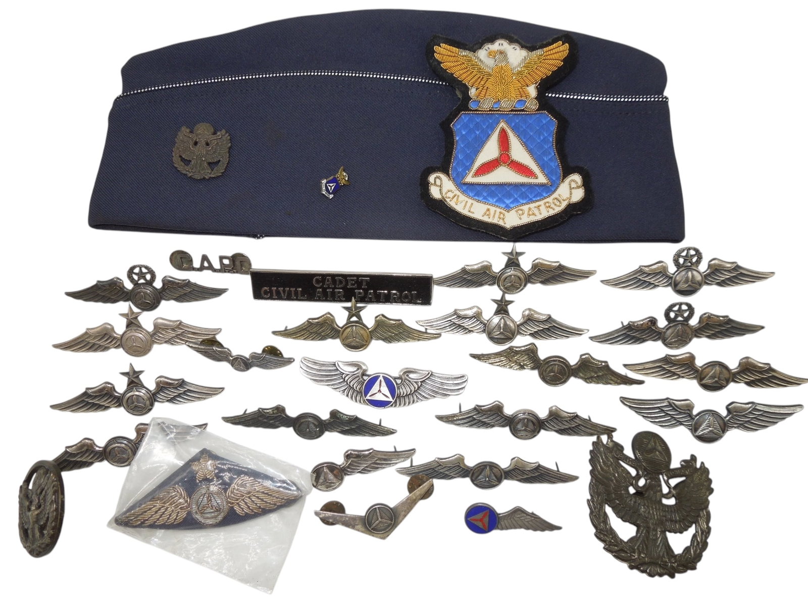 Post WWII - Vietnam CAP Civil Air Patrol Wings Badges: Large lot of wings, cap, and insignia. Some are maker marked and 8 are sterling