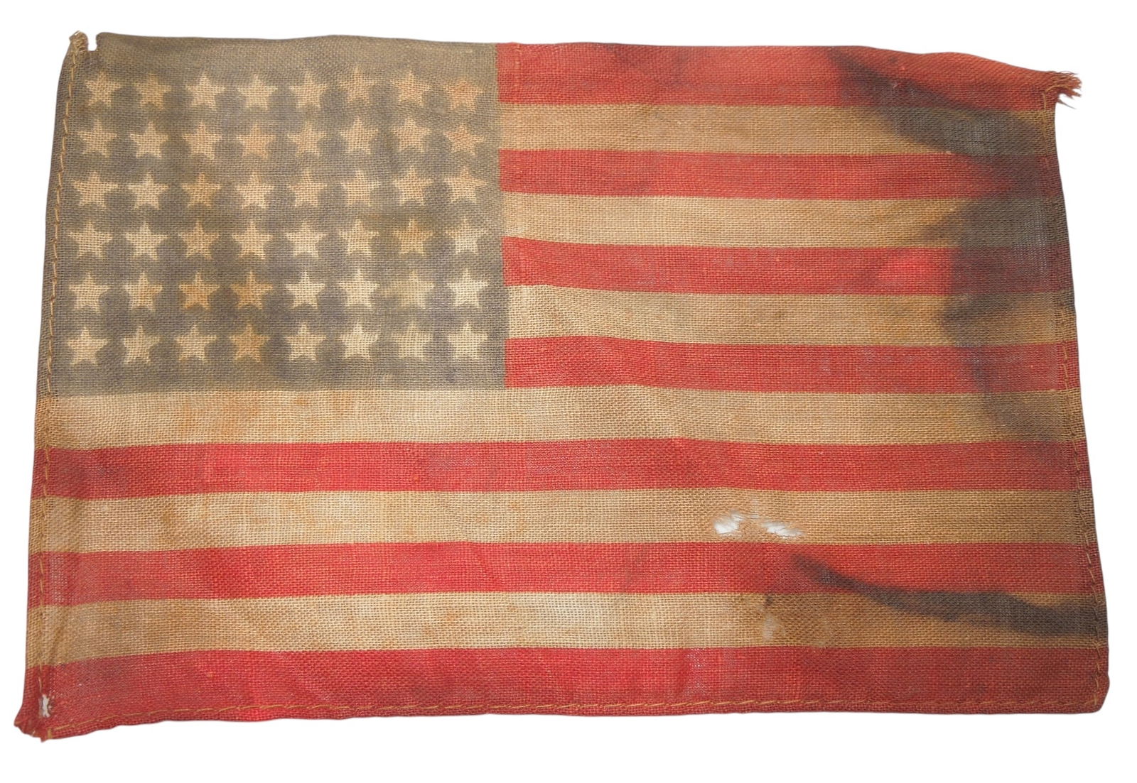 Small 48 Star WWII Flag Found Near Pearl Harbor Attack: Small flag with a note that it came from the Pearl Harbor area when bombing was going on. No further information available.