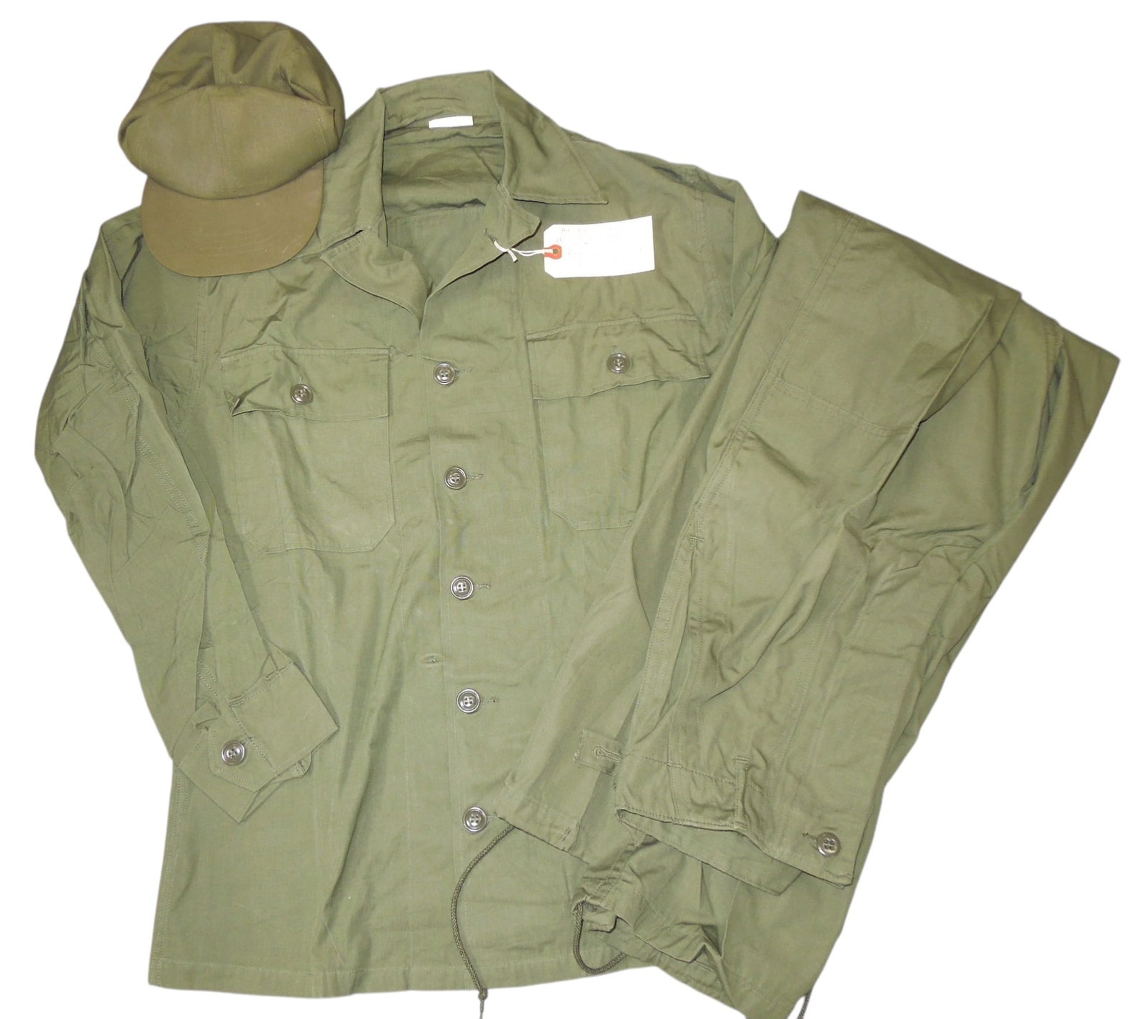Vietnam War US Army Unissued Special Warfare Fatigue Uniform Set: Rare uniform set, all unissued of a 1974 dated ball cap, size 7 1/8, Size Small OG-107 Special Warfare Cotton Shirt, and matching 1962 dated trousers, also a size small.