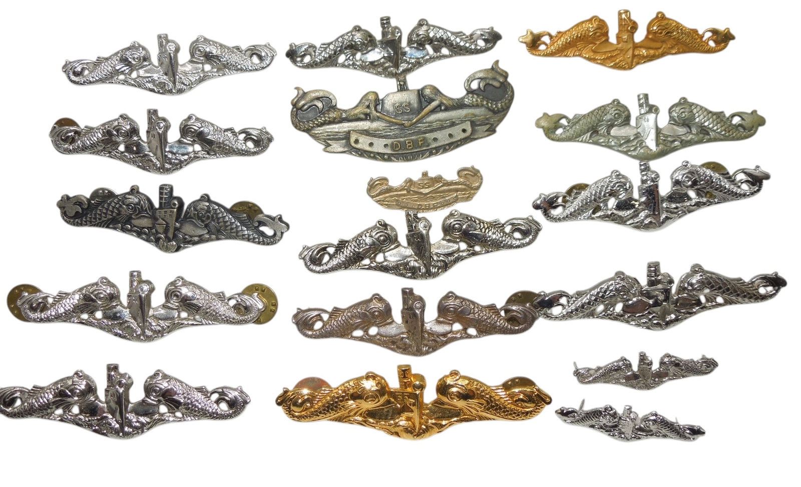 Post WWII - Modern US Navy Submarine Qualification Badges Pins: Large lot of insignia as shown. Some are sterling or maker marked on the back.