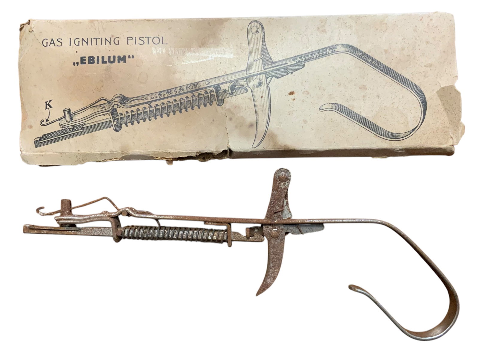 1930s Ebilum German Gas Ignitor Pistol with Original Box: New Method Gas Igniting Pistol by Ebilum of Germany. This piece looks like a gun and shaped like a firearm. This piece is a flint sparker for lighting gas lights. As you pull the trigger it pulls back