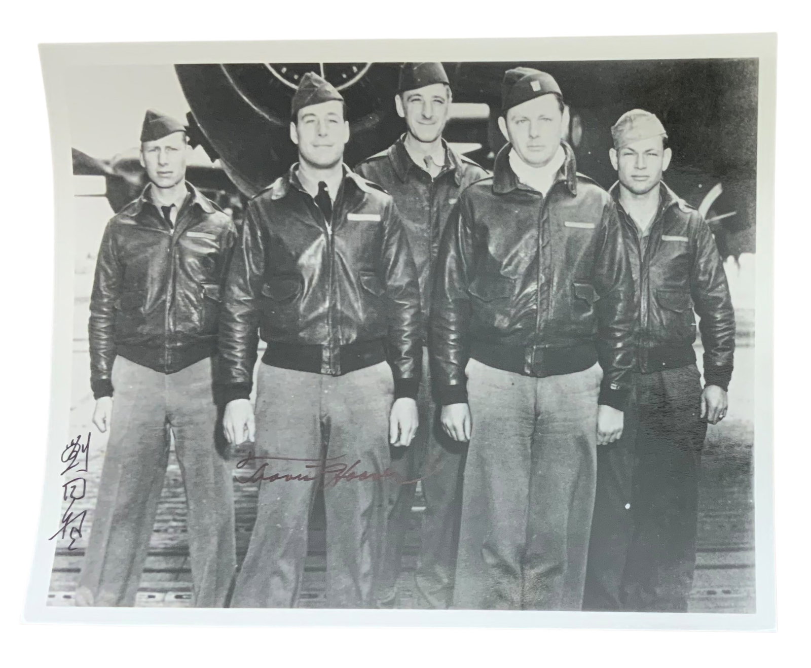 WWII Doolittle Raider Travis Hoover & Tung Sheng Liu Crew #2 Signed Photo: Colonel Travis Hoover (September 21, 1917-January 17, 2004) enlisted in the National Guard on November 9, 1938 and was a flying cadet in the regular Army in August of 1939. He completed pilot training