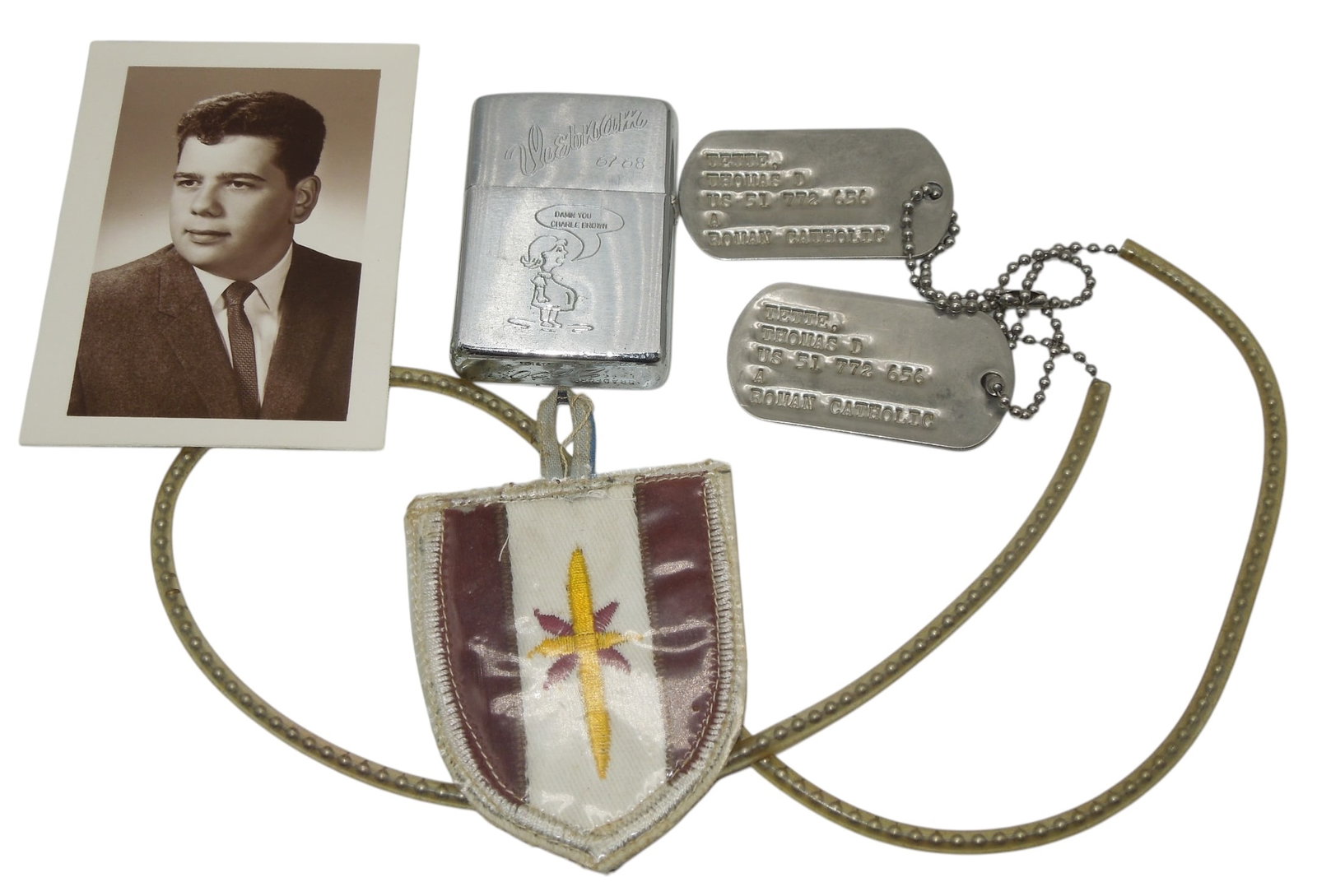 Vietnam War US Army Medic Dog Tags Lighter & Patch Group Charlie Brown: Lot of items to a Vietnam War Army medic- Dog Tags, photo, theater made pocket patch, and a Vietnam Doc medical Zippo with a Damn You Charlie Brown pregnant woman engraved.
