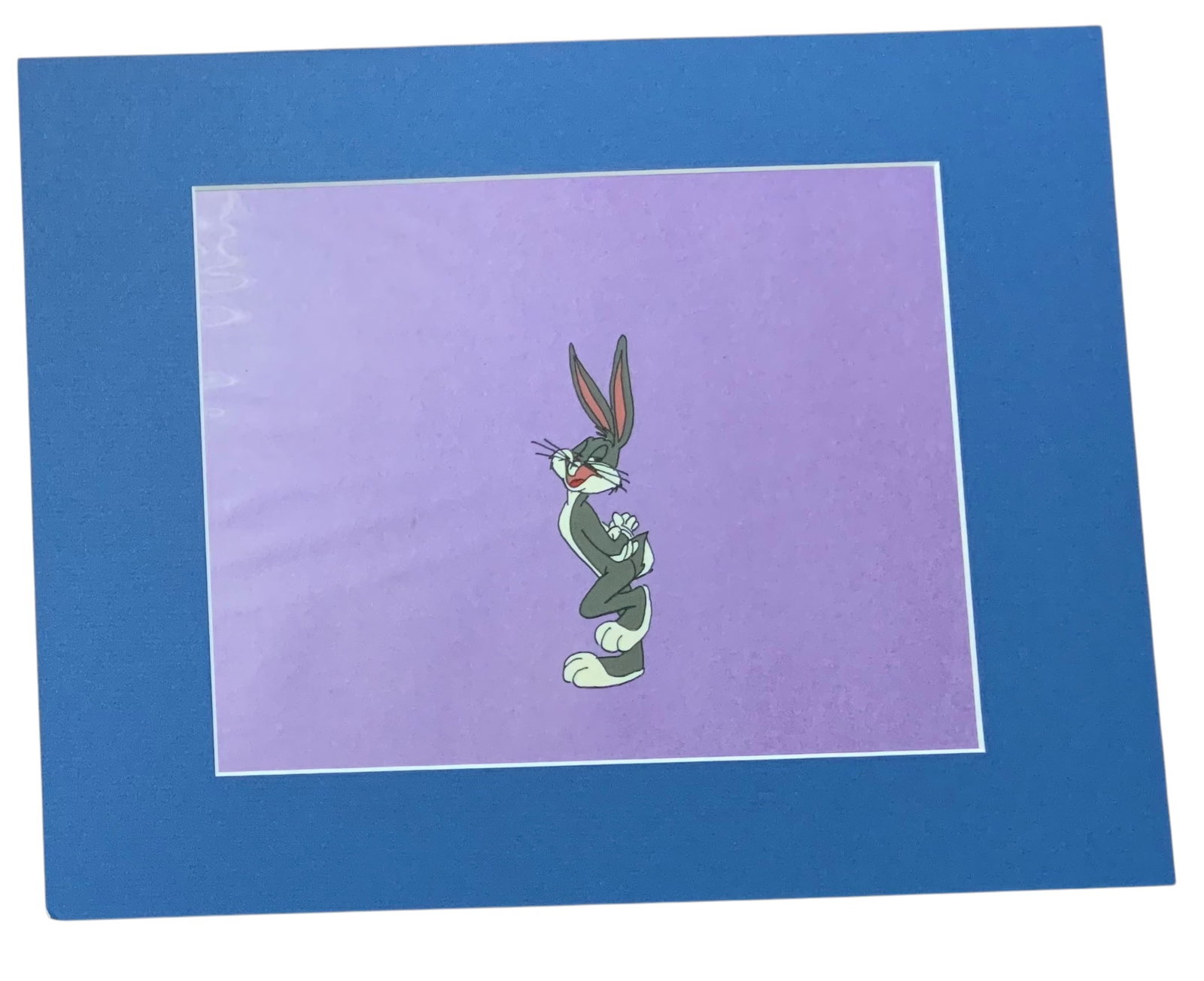 Bugs Bunny Warner Bros. Looney Tunes Matted Production Animation Cel: Bugs Bunny Warner Brothers Looney Tunes Matted Production Animation Cel. Since each piece is matted we are unable to see the reverse of the image. A certificate of authenticity does not accompany this