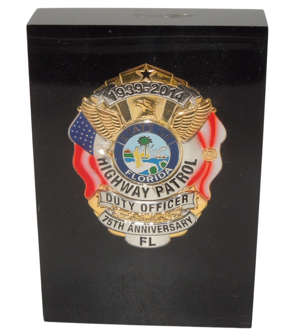 2014 Florida Highway Patrol Duty Officer 75th Anniversary Badge in Lucite: Pin removed off back of the badge and encased in lucite.