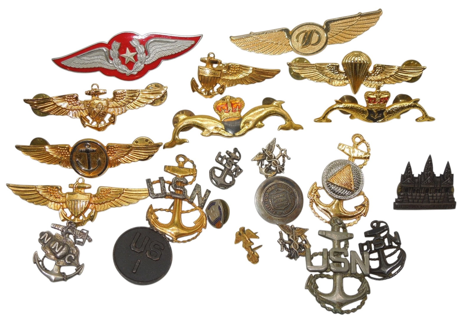 Lot WWII - Cold War US Navy CPO Pins British Submariner & Naval Aviator Astronaut Wings: Lot of various pins as shown.