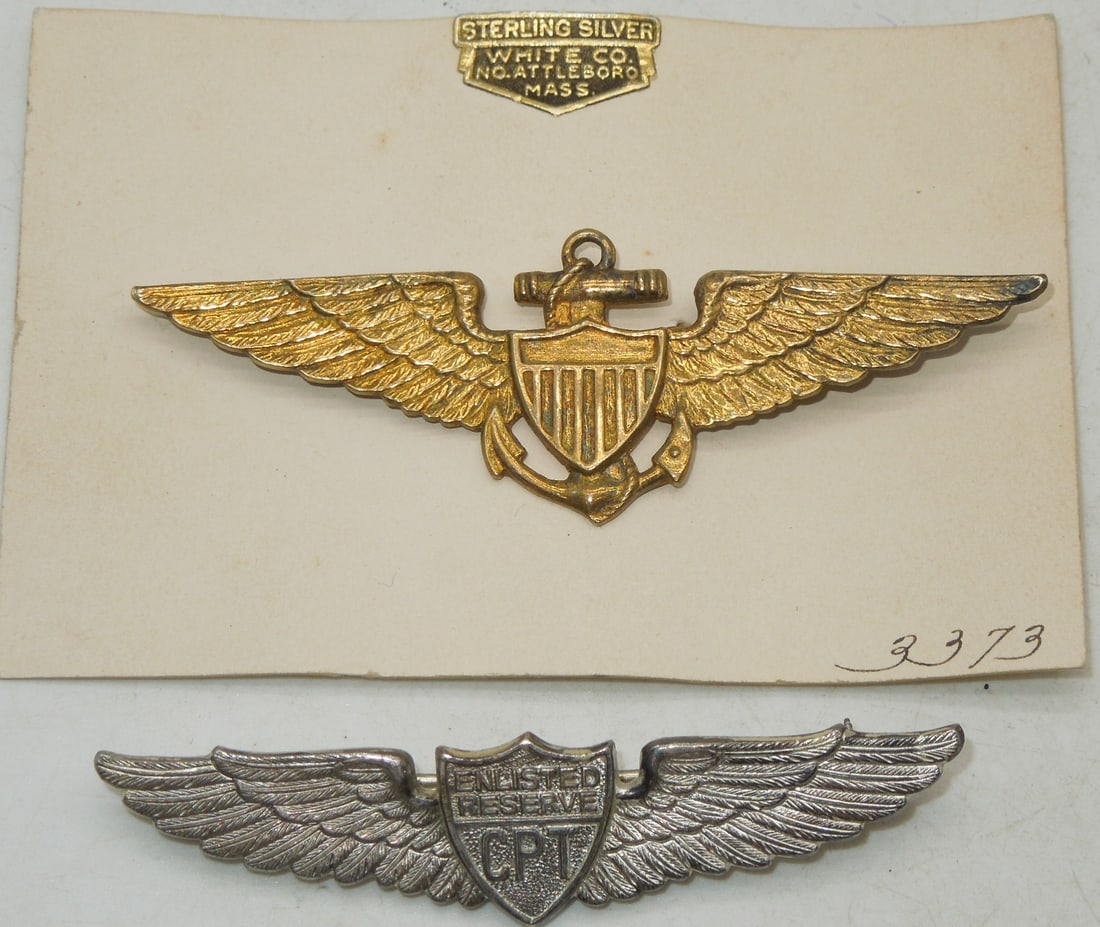 WWII US Naval Aviator Wing On Card & CPT Enlisted Reserve Sterling Wing: Two Wings- The Navy wing is thin and on the card, but does not appear to be marked. The Civilian Pilot Training Program wing is sterling marked.