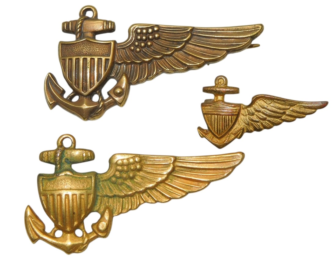 Early WWII US Navy Half Dirigible Balloon Pilot Wings Lot (3): The mini half wing is Pre WWII and unmarked, the bottom is Gemsco and missing the catch, the top is marked Nanco Rolled Gold an engraved 1942.