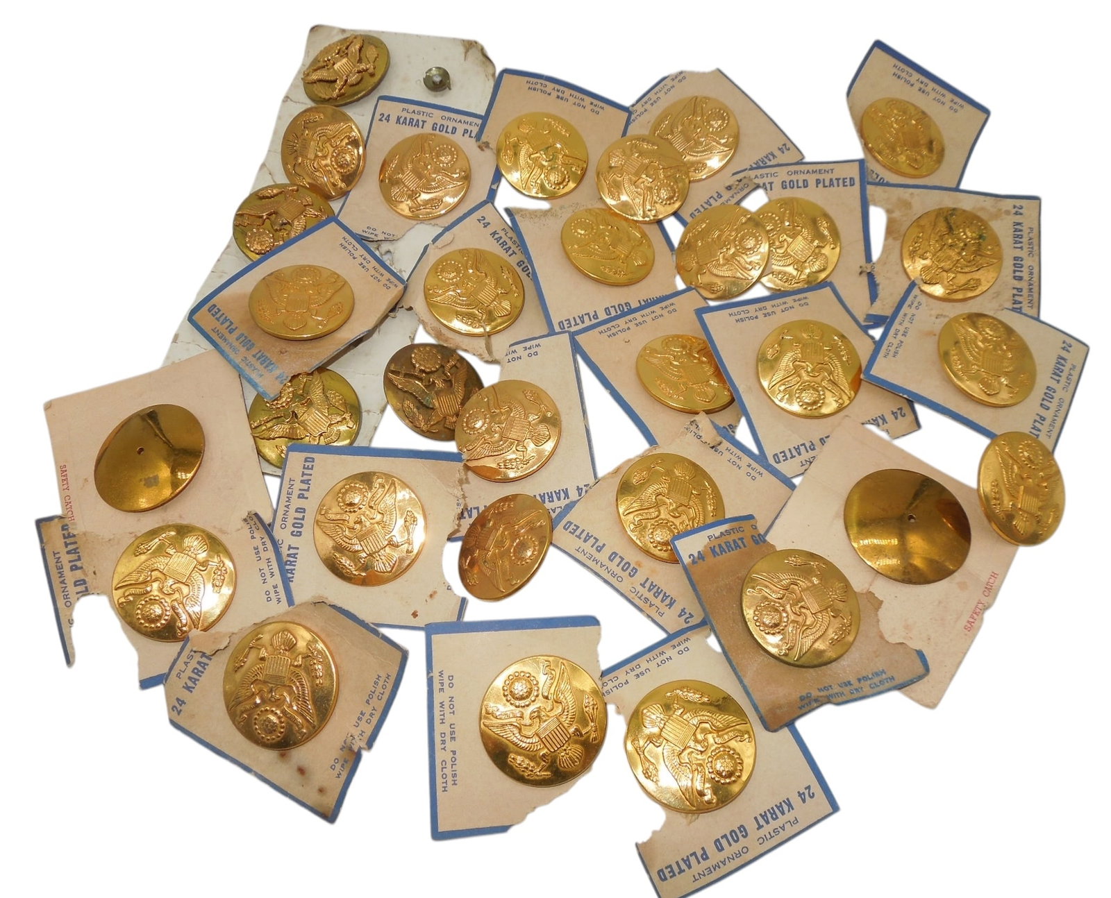 Lot WWII US Army 24k Gold Plated Enlisted Visor Cap Hat Badges Pins: Lot of carded and loose economy plastic type cap badges. Most of the cards have tears and rips.