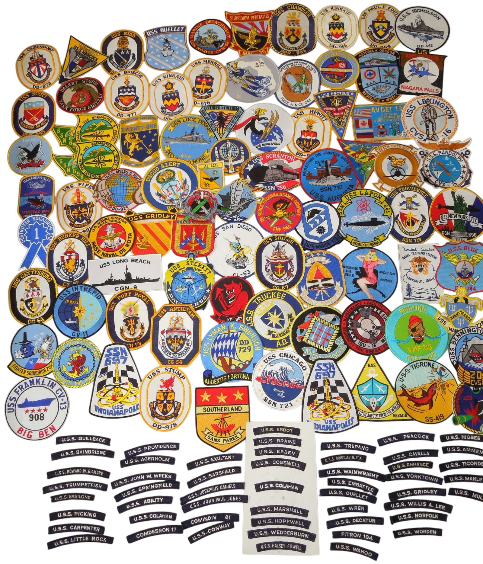 Huge Lot 1990s - 2000's US Navy Ship & Submarine Patches & Tabs: Lot of over 130 patches as shown. Many have a paper and glue residue on the back.
