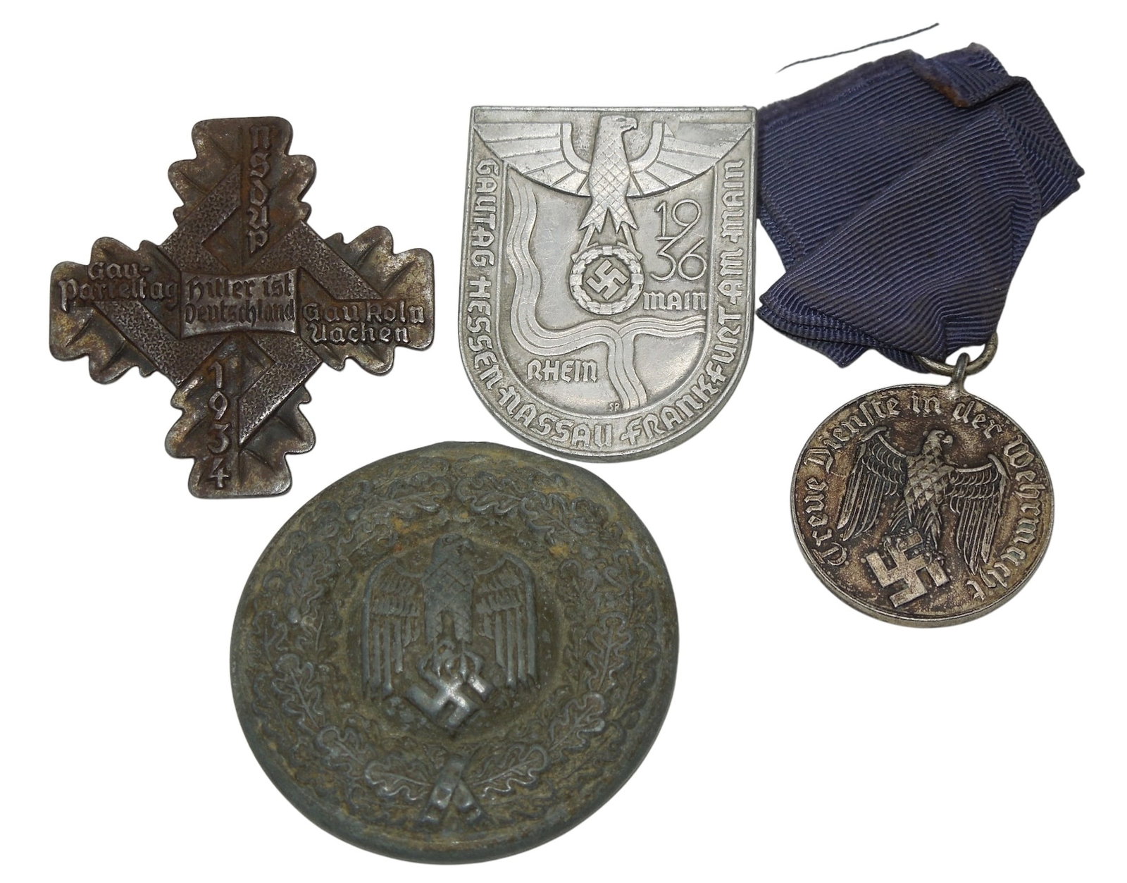 Lot of WWII German Badges & Medal 1936 Gautag 1934 NSDAP: WWII as shown. Well worn condition
