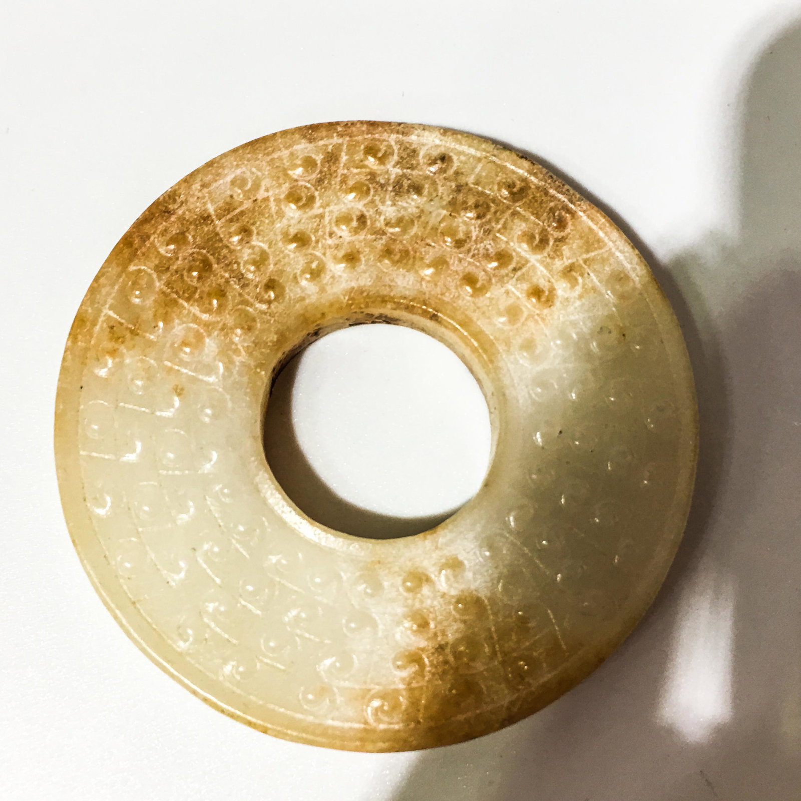 White jade pendant in Han Dynasty: Measurement ï¼š Diameter5cm