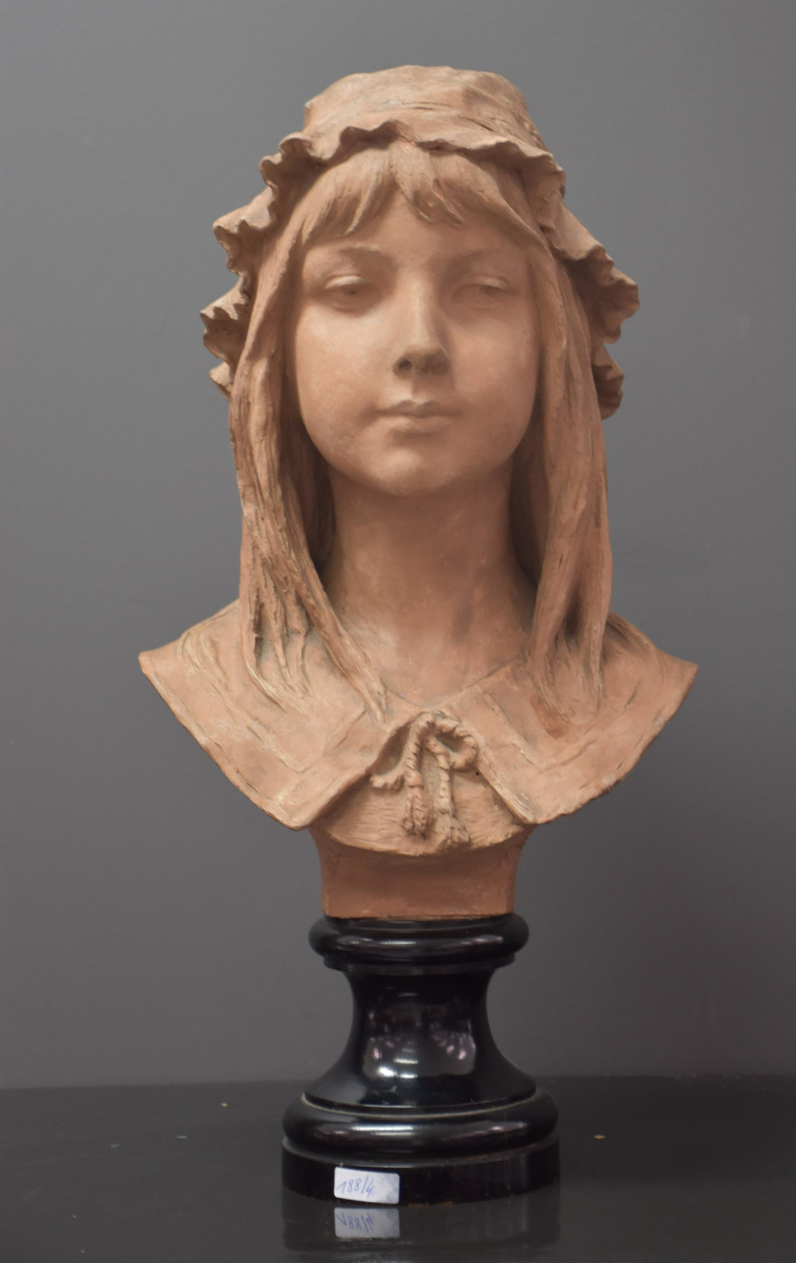 Emile Jean Namur (1852 - 1908). Terracotta bust of a (1 of 2)
