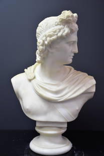 Antonio FRILLI (c.1880-1920). Carrara marble bust of: Antonio FRILLI (c.1880-1920). Carrara marble bust of Apollo signed A. Frilli in Florence. Ht 60 cm.