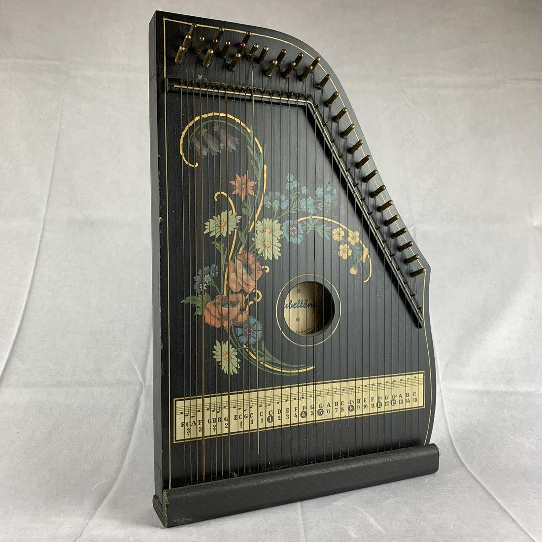 Antique Jubeltone Zither: An antique German Jubiltone zither in great original condition. Great original paint and complete. 18"T.