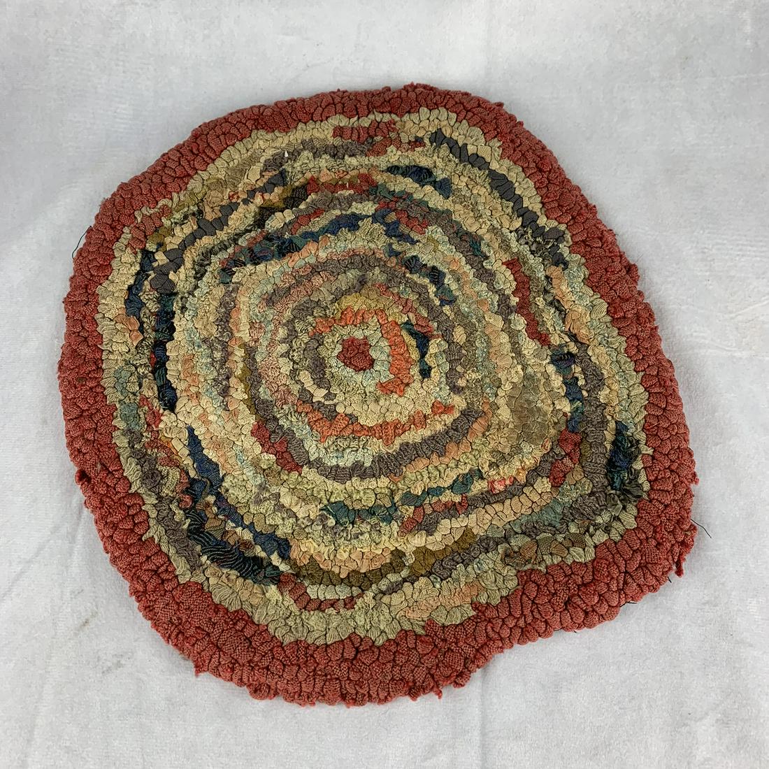 Antique Country Hand Woven Rag Rug Mat: An antique hand woven 12 ½” rag rug mat. Nice country colors . Excellent