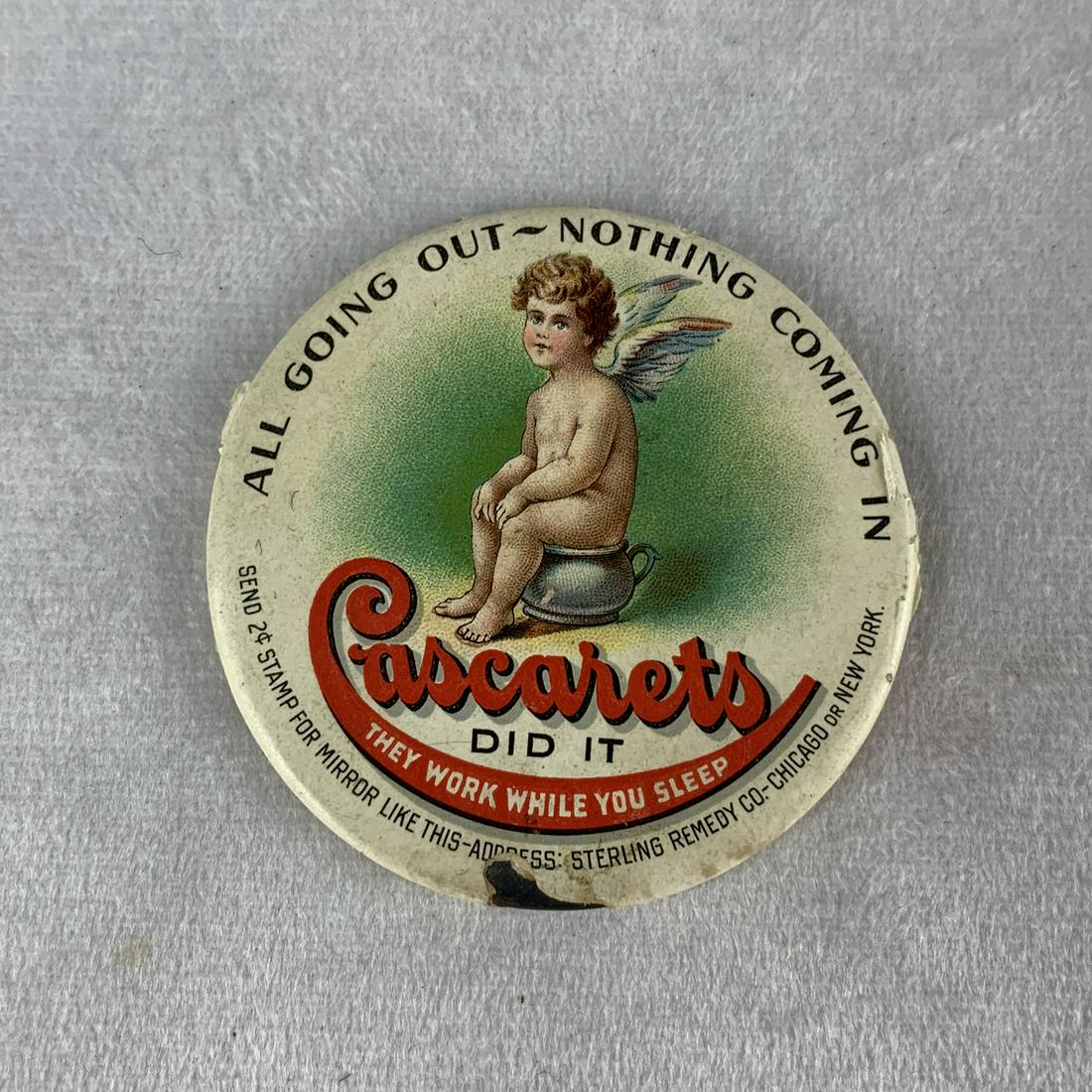 Antique Cascarets Advertising Pocket Mirror: Nice graphics on this antique Cascarets advertising pocket mirror. 2”. Mirror good, some wear to edge of celluiod covering.