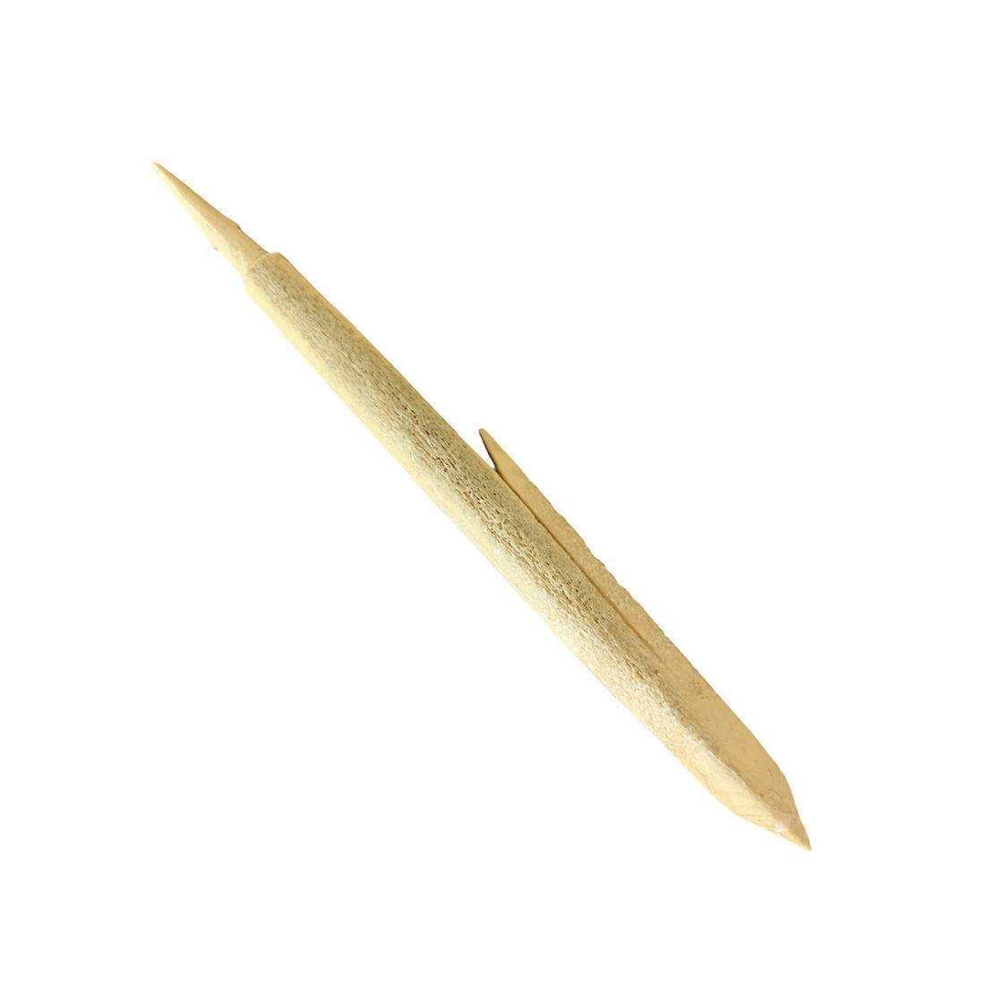 19th Century Inuit Harpoon Point: This bone harpoon was carved in a triangular shape from the tip gradually tapering to the end where the shaft would have fit into the harpoon shaft itself and a tether attached to remain attached to t