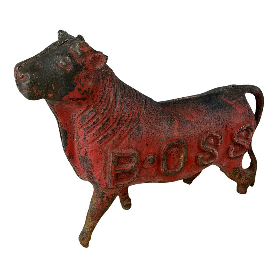 Cast iron "BOSS" Windmill Weight: Original "BOSS" Windmill weight with traces of red painted, losses to horns, edge of ear, and feet bottoms. Feet mostly intact, however, removed from original base. Great look. Measures 11 inches high