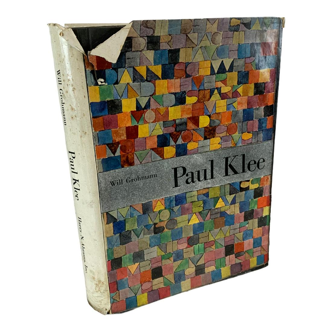 Vintage Book On Life And Art of Paul Klee.: A vintage 447 page hardcover book on the life and art of Paul Klee. With original dust cover. Grohman, Abrams publisher. 12” x 9”. Book has some pages sticking together from humidity.