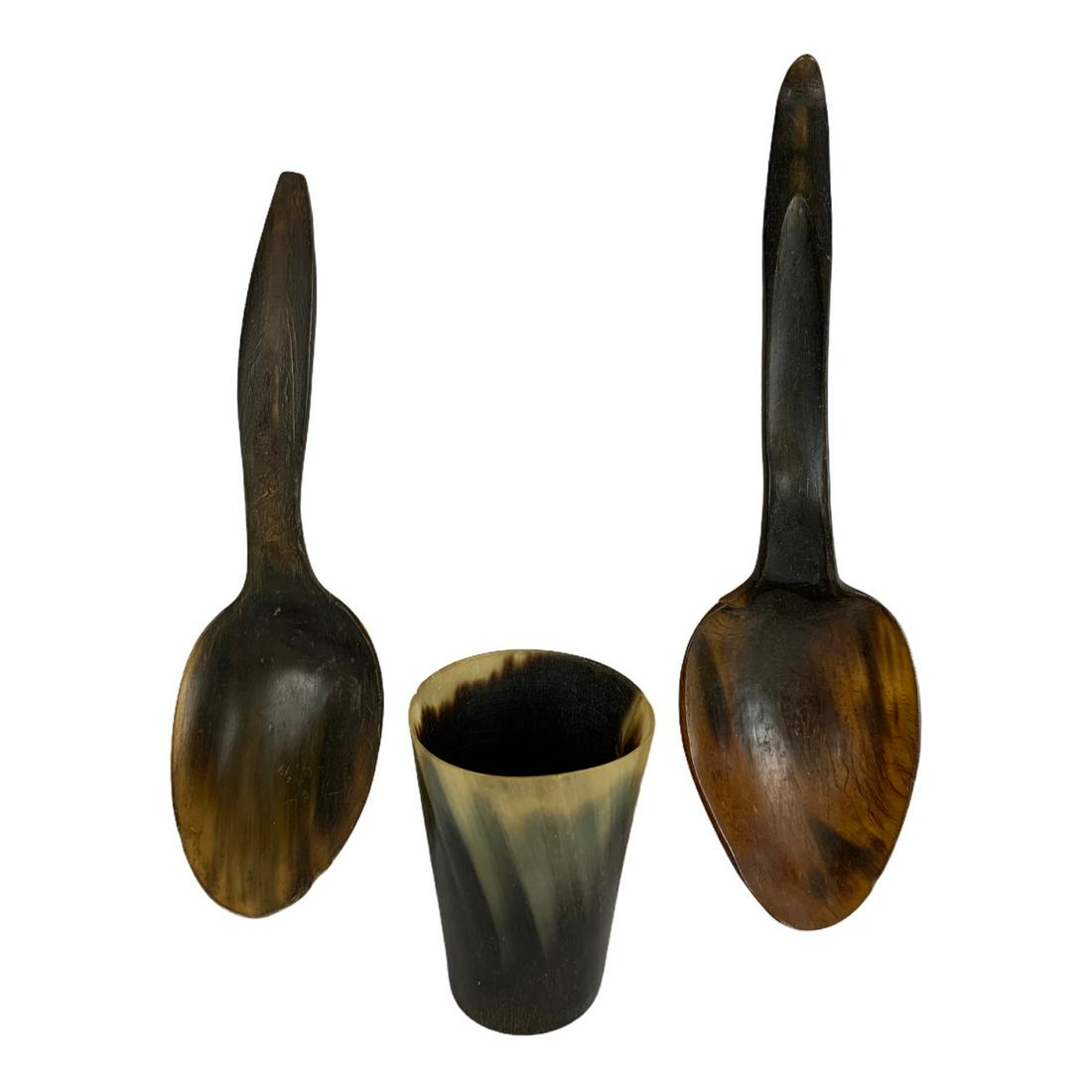 Group of Early Horn Serveware: Three pieces of early 19th c. Carved horn serveware. This group features two spoons with finely shaped handles, and a small horn beaker. Spoons measure 8 3/4 inches and 7.5 inches in length. Horn beak