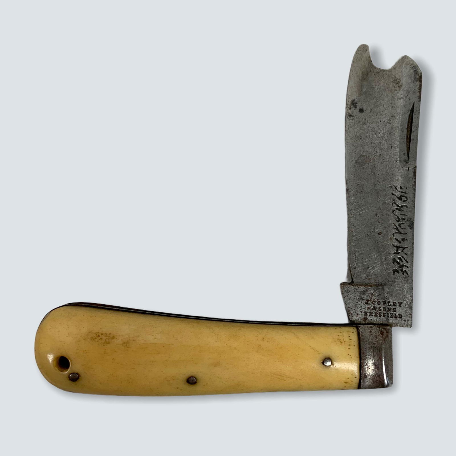 Ciphered Folding Knife: Marked [ J. Cotley & Sons Sheffield , 3 1/2 inch long folded, 6 1/2 inch open. Cyphered design on blade. 3 pin bone handle, on side of bone with damage. Knothced end blade seems to be good.