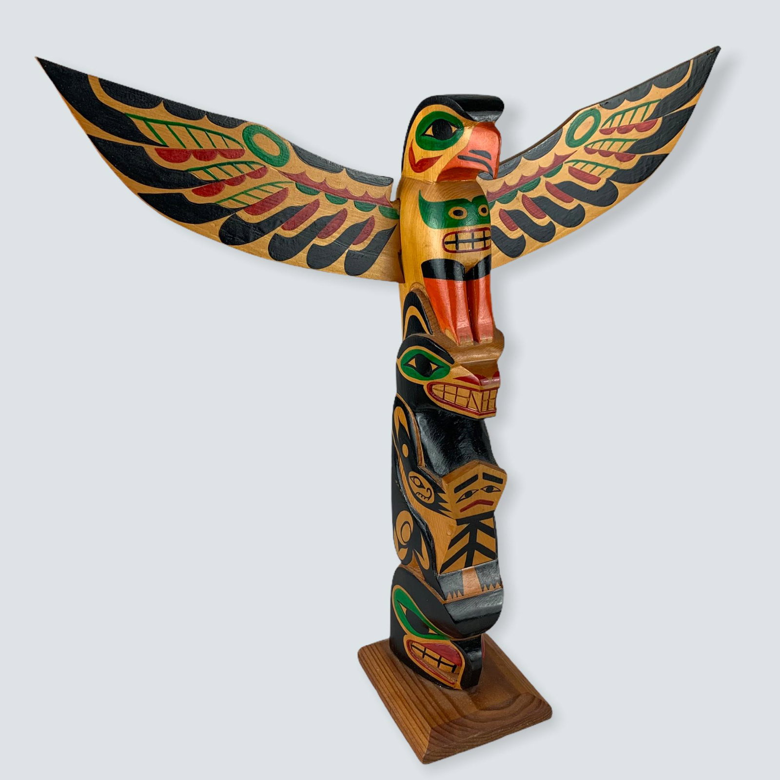 Carved Totem by W. Mack: A signed 15 totem pole carved b y W. Mack, Bella Coola B.C., excellent