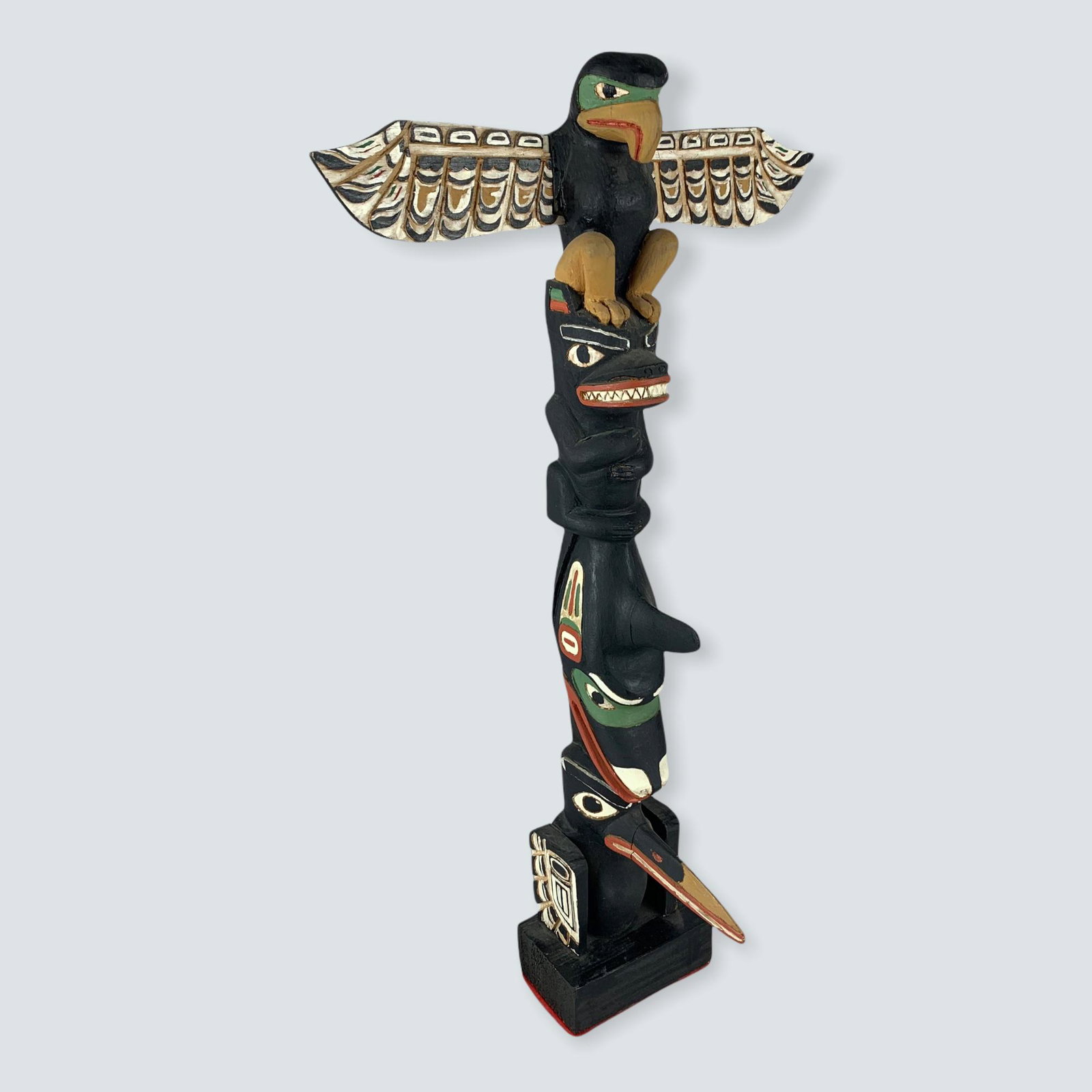 Very Nice Carved Totem: Here is a fine carved totem pole, 17 1/2, carved with Eagle-Bear-Killer whale-& Raven. Very nice !