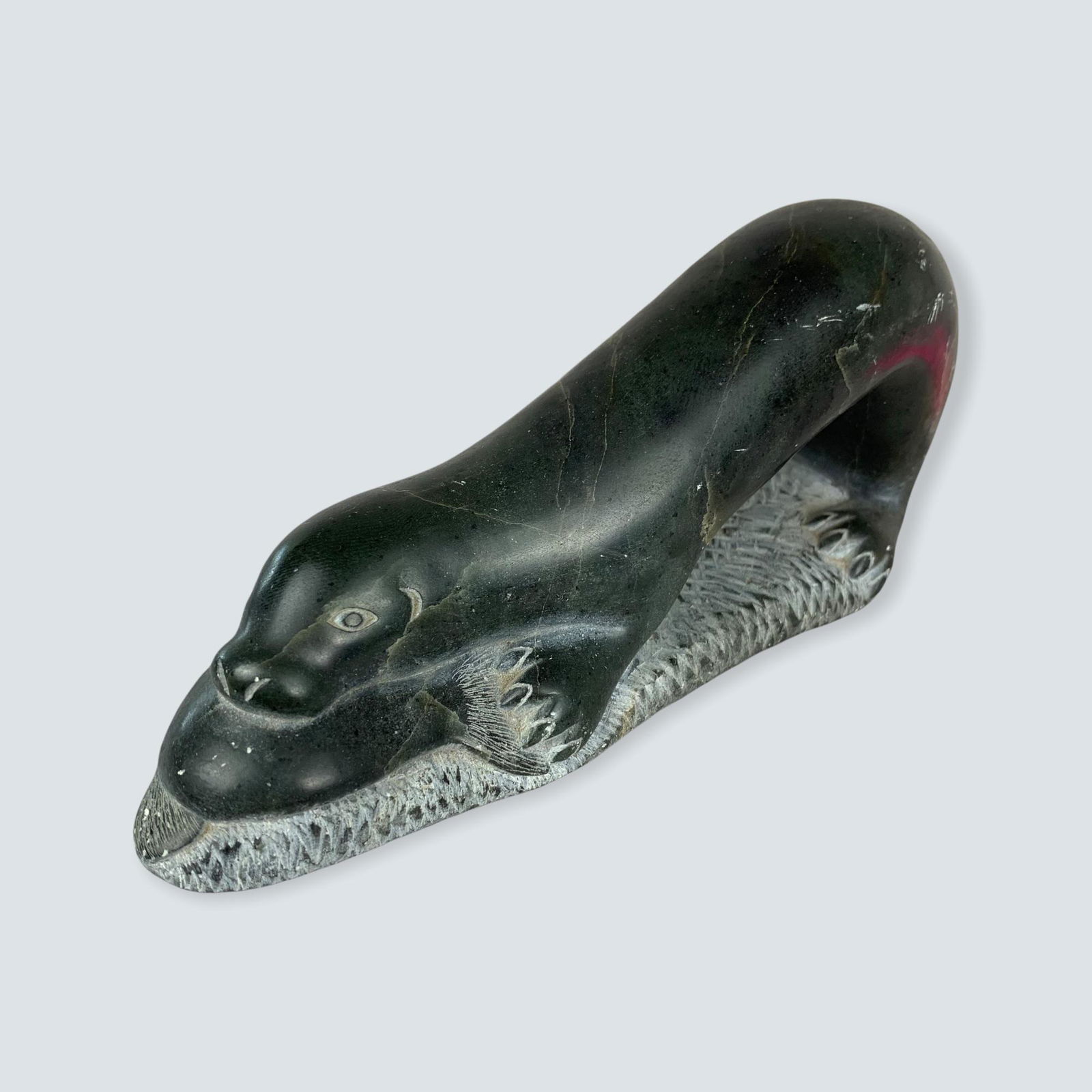 Eskimo carved soapstone carving of Otter Eating Fish, (1 of 2)